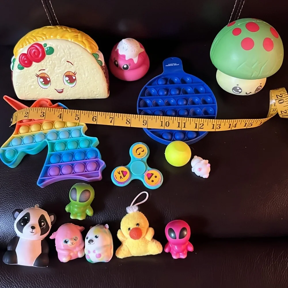 Bundle of squishies and Fidget and Animal Figures.